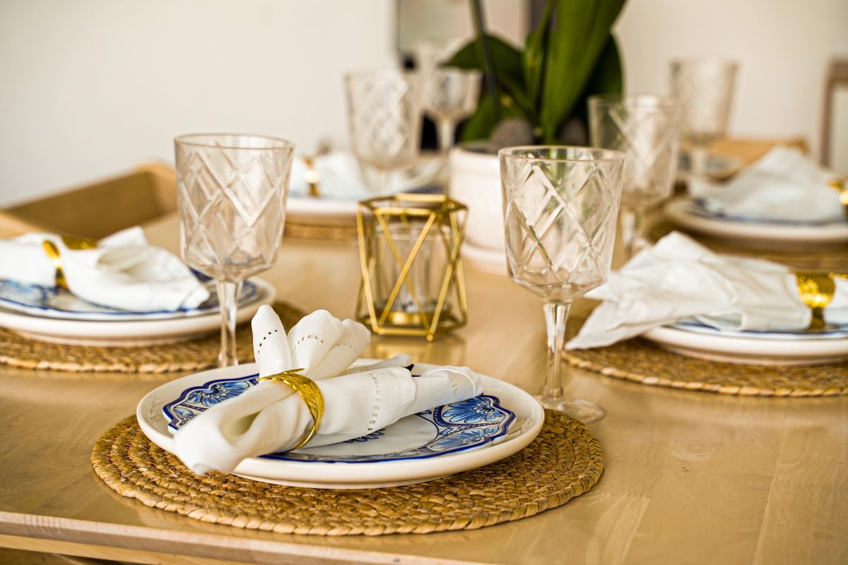 Elegant table setting with gold accents